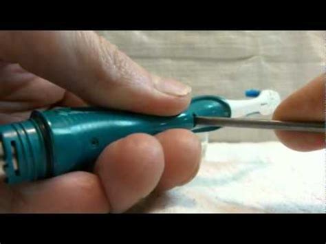 Unscrew the bottom portion of your toothbrush by turning counterclockwise. How to open a Pulsar Toothbrush and change the battery ...