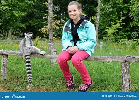 A Girl Near The Tame Lemur Stock Image Image Of Catta 40463993