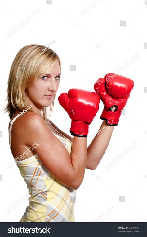 A Beautiful Young Woman Wearing A Pair Of Boxing Gloves Stock Photo