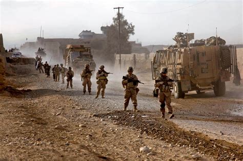 Us Marines And Afghan Soldiers Conduct A Census Patrol In The Sangin