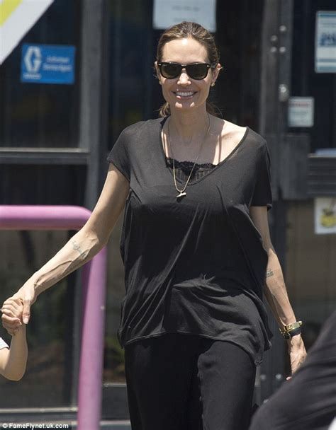 Angelina Jolie Displays Shockingly Veiny Arms While Taking Twins Vivienne And Knox Shopping In