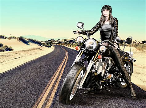 Attractive Biker Girl Sits On Her Motorcycle In The Desert Photograph