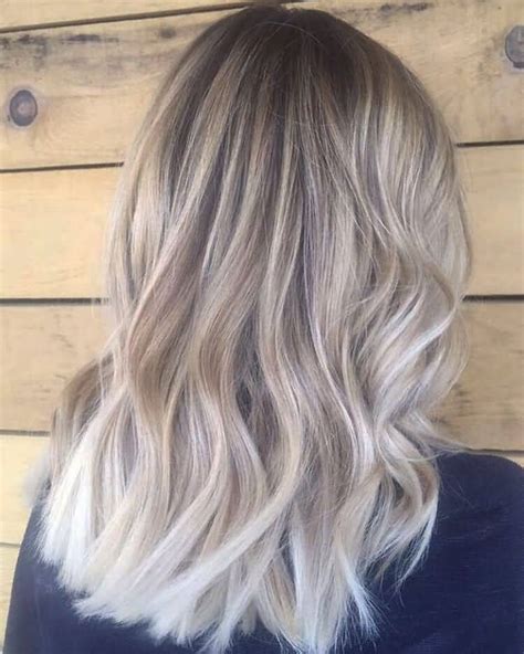Swept up, carefree, feminine—it's the way you feel in love, and it's the way your hair should look, too. 50 Unforgettable Ash Blonde Hairstyles to Inspire You