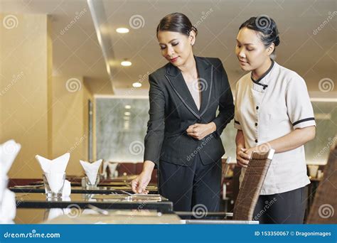 manager and waitress at work stock image image of working adult 153350067