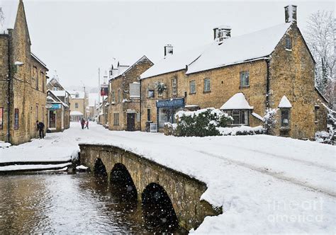 Bourton On The Water In The December Snow Photograph By