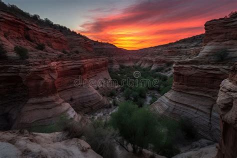 Peaceful Sunset With The Fiery Canyon Walls Providing A Dramatic