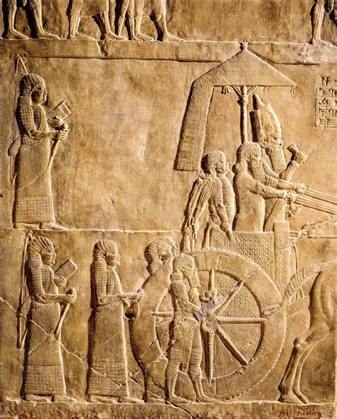 Assurbanipal En Su Carro Conducido Por Un Auriga Y Acompa Ado De
