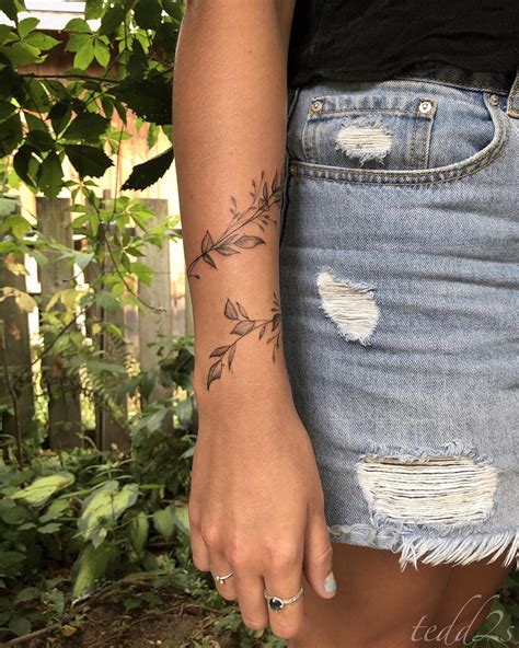 Wrap around upper arm snake tattoo ideas. Tedd Hucks on Instagram: "Leafy wrist wrap, thanks again ...