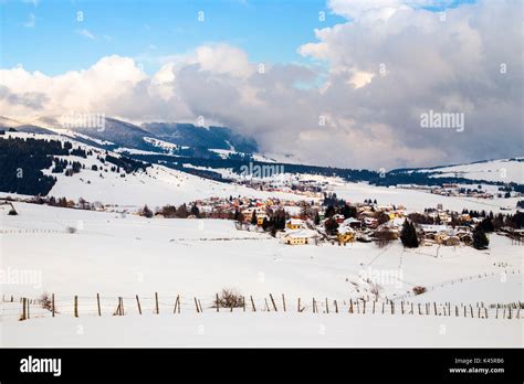 town altopiano of asiago province of vicenza veneto italy coloured houses in winter