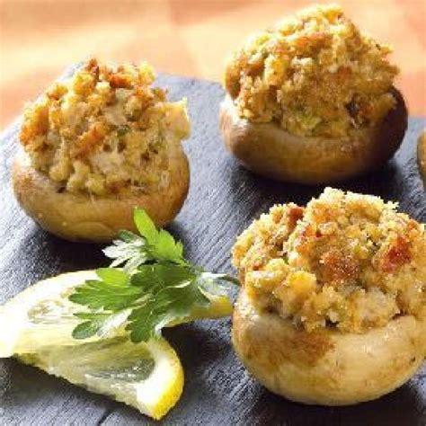 Crab stuffed mushrooms are an easy bite size appetizer of sweet crab meat and cheese baked to perfection inside mushroom caps, topped with buttery breadcrumbs. Crab Stuffed Mushrooms 5 | Just A Pinch Recipes