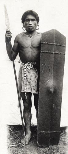 657276 An Ifugao Warrior Stands With His Steel Headed Lance And Shield