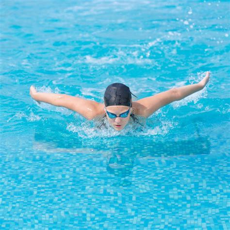 Young Girl Swimming Butterfly Stroke Style Stock Photo Image Of