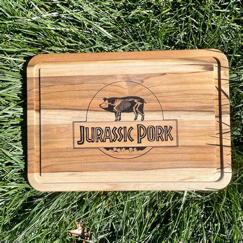 Jurassic Pork Cutting Board Created By Parker
