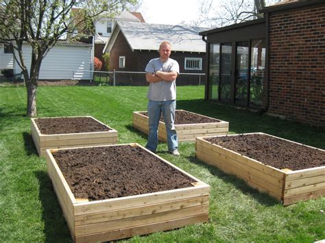 Raised gardens make gardening much easier. BP Builds Four Raised Garden Beds | Vegetable garden boxes ...