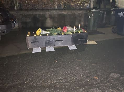 A coffin lays outside of the Eugene City Manager’s house. Protesters