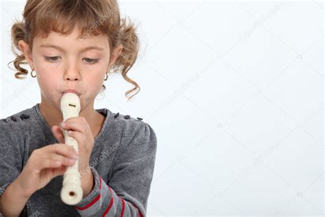 Girl Playing A Recorder — Stock Photo © Photography33 7953328