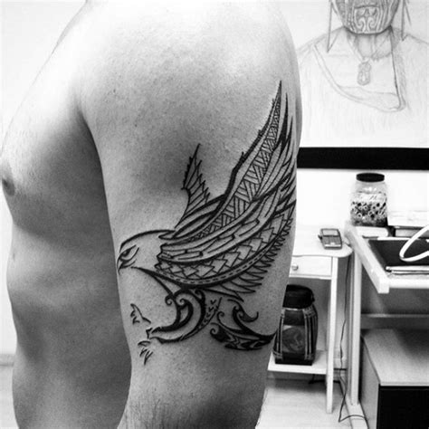 dark black and white flying eagle tattoo on shoulder in tribal style tattooimages