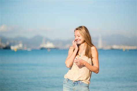 Young Girl Enjoying Her Vacation By The Sea Stock Image Image Of