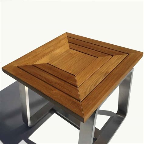 Uniting marine grade 316l stainless steel and grade a teak with a bold nautical lean, the odyssey. Teak Stainless steel Teak Outdoor Side Table - Rialto ...