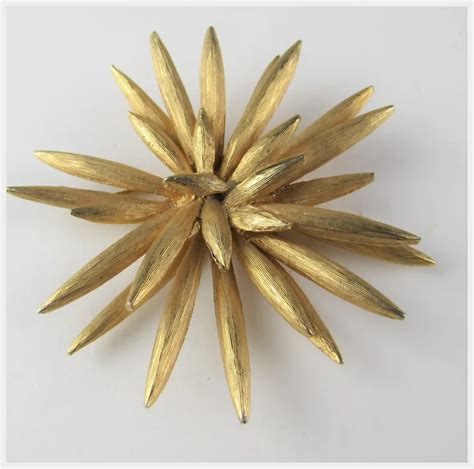 Vintage Boucher Signed And Numbered Brushed Gold Tone Starburst Pin