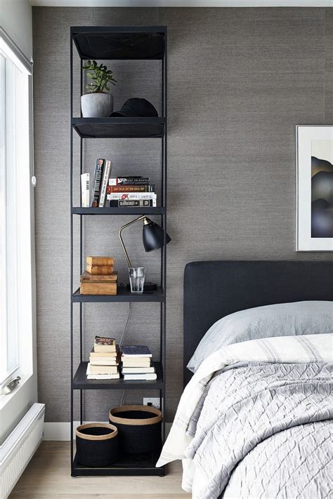 The white cover has a gray diamond design down the center, accented by gray tassels on each corner. toronto ikea vittsjo shelf bedroom contemporary with gray accent wallpaper wall queen size ...
