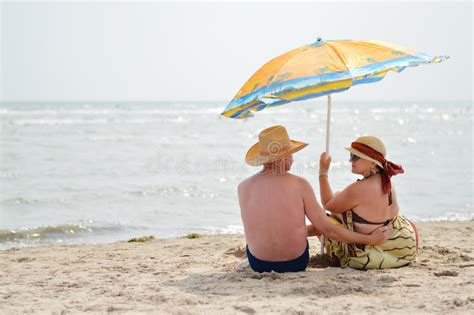 sea walk and happy mature couple at seashore sandy beach and holding hands stock image image of