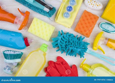 Collection Of Various Colorful Household Cleaning Product On Wooden