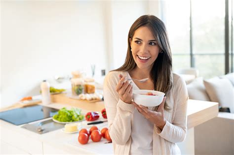 Woman Eating A Healthy Breakfast Stock Photo Download Image Now Istock