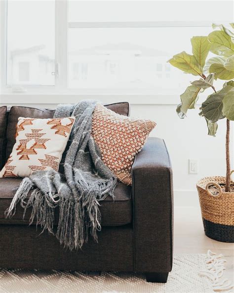 How To Style Your Home With Throw Blankets In 2021 Sofa Blanket Decor