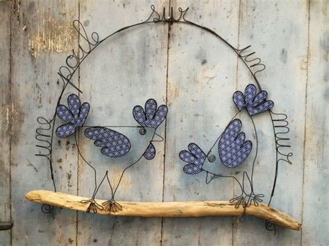 Metal hen wall decoration with driftwood and wire, a hen ...