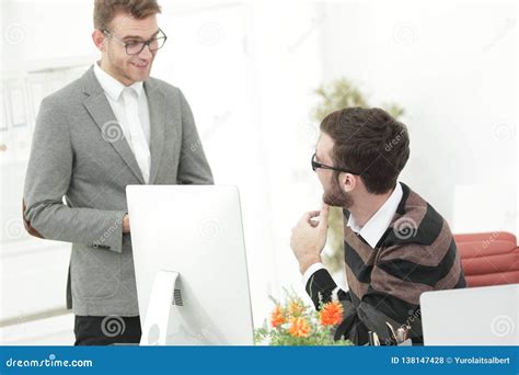 Manager Talking With An Employee In The Office Stock Photo Image Of