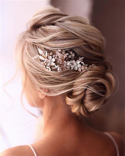 Trending wedding reception hairstyles that'll compliment your wedding reception look, perfectly. 30 Stunning Updo Wedding Hairstyles for 2021 Brides - Love ...