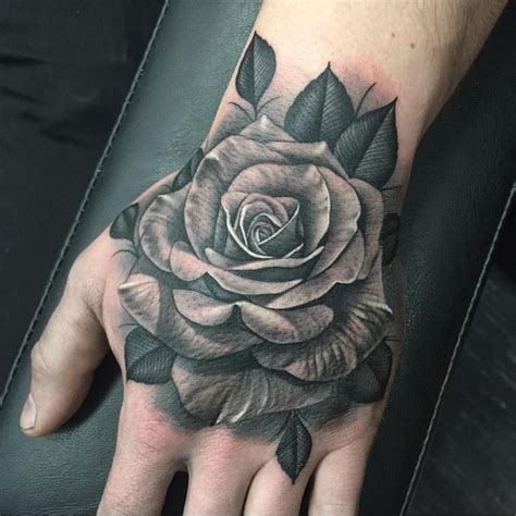 Awesome realistic thorny rose tattoo for men hand. Instagram | Hand tattoos for guys, Hand tattoos, Rose ...
