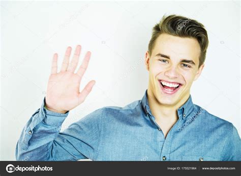 Young Handsome Man Waving Hand White Background Copyspace Stock Photo