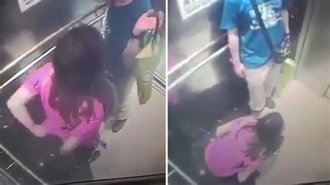 woman caught on cctv urinating in lift as male companion holds bag and looks on irish mirror