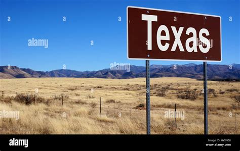 Texas Road Sign With Blue Sky And Wilderness Stock Photo Alamy