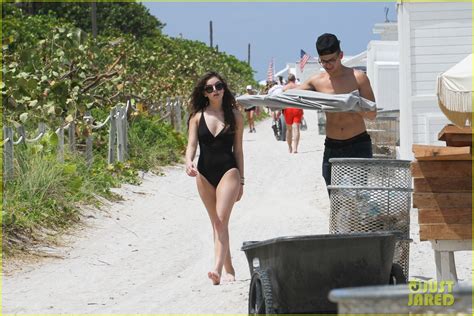 Hailee Steinfeld Wears Plunging One Piece For Miami Beach Day Photo