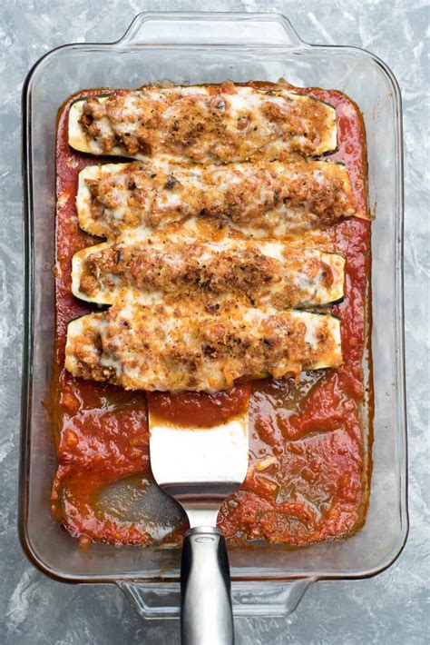 Zucchini boats packed with seasoned ground turkey and topped with cheese makes a meal that will please the entire family. Italian Stuffed Zucchini Boats - Valerie's Kitchen