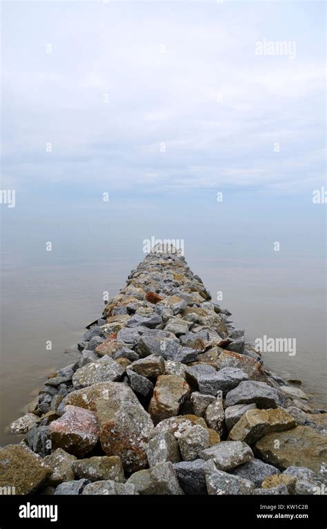 Stacked Rocks At The Beach Wave Breaker Stock Photo Alamy