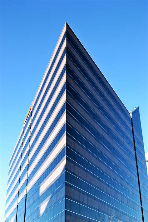 Glass Wall Of Business Center And Sky Reflection Hoodoo Wallpaper