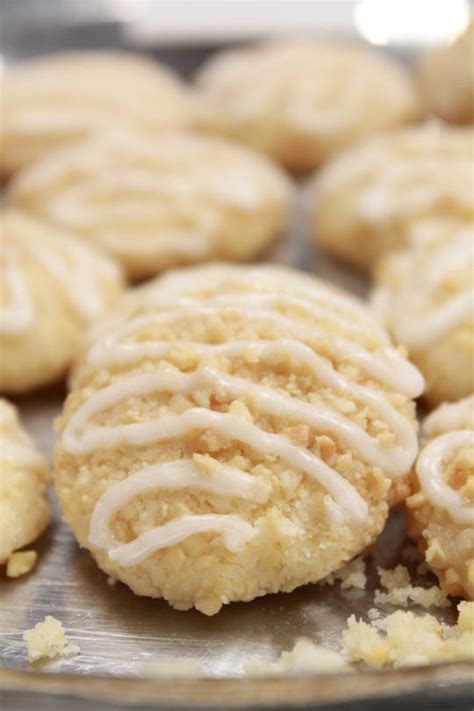 These lemon sugar cookies are thick and chewy and easy to freeze. Christmas cookie recipes: Lemon Sno Balls are crumbly good
