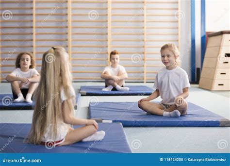 Young Girls In Pe Class Stock Photo Image Of Mats Gymnastics 118424208