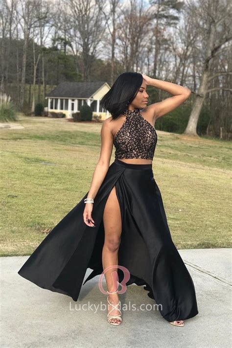 This Two Piece Black Prom Dress Consists Of A High Neck Lace Crop Top
