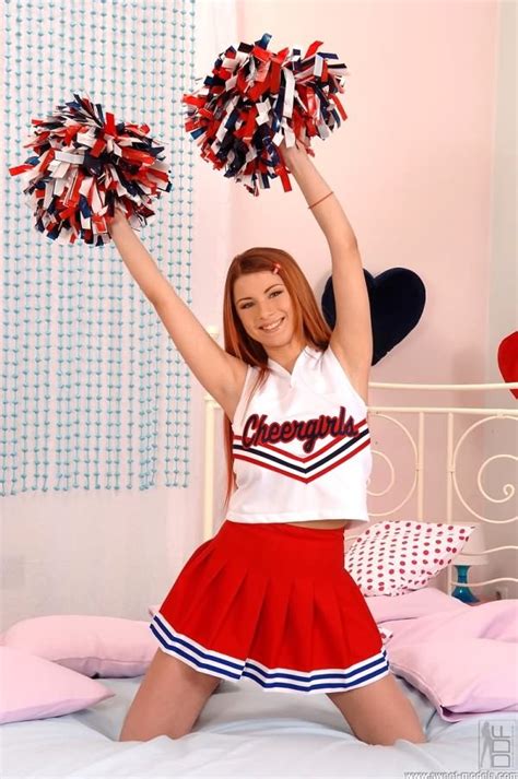 Busty Redhead Cheerleader