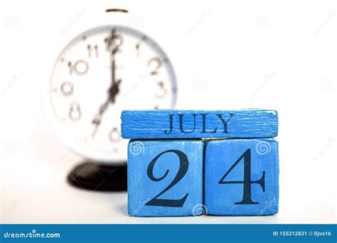 July 24th Day 24 Of Month Handmade Wood Calendar And Alarm Clock On