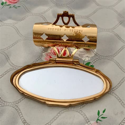 stratton lipview mirror and lipstick holder vintage gold tone lip mirror