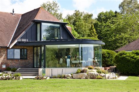 A Dining Room Extension Incorporating Curved Structural Glazing A Zinc