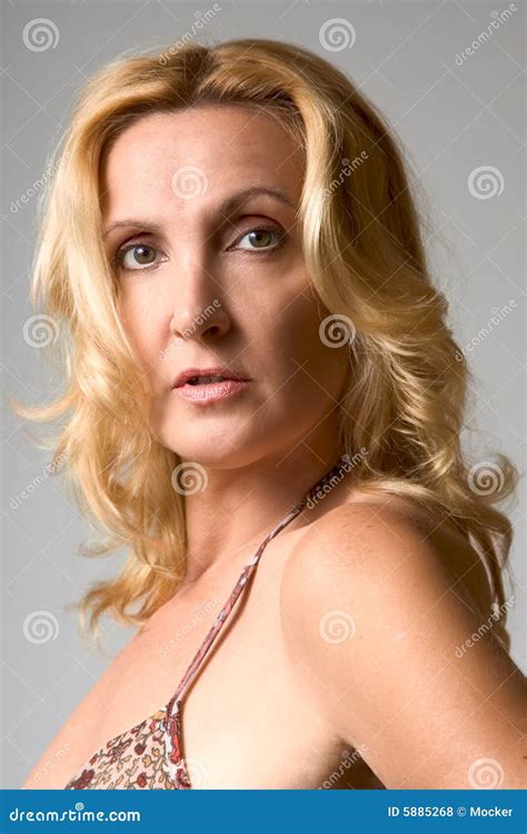 Portrait Of Mature Blond Woman Stock Photo Image Of Blond Shoulders