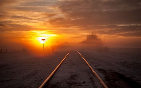 Download Wallpaper 2560x1600 Railway Fog Snow Sunset