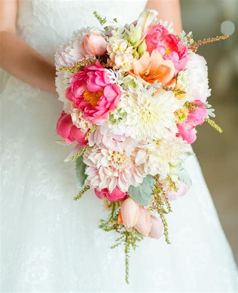 Brides having beach weddings tend to pick bolder colors for their beach wedding bouquets. 13 Modern Cascading Wedding Bouquets
